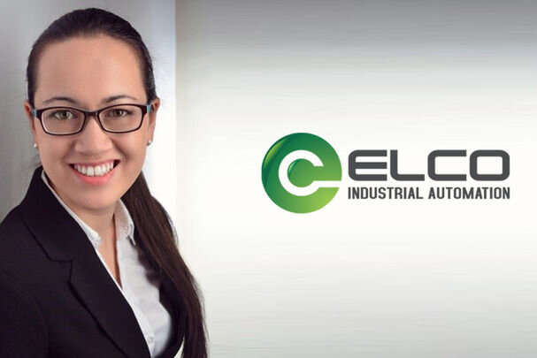Fanny Seifert in front of the ELCO Industrial Automation logo